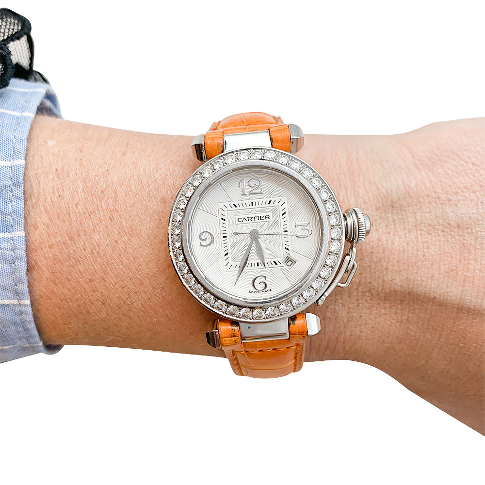 Cartier "Pasha" watch in white gold, diamonds and leather.