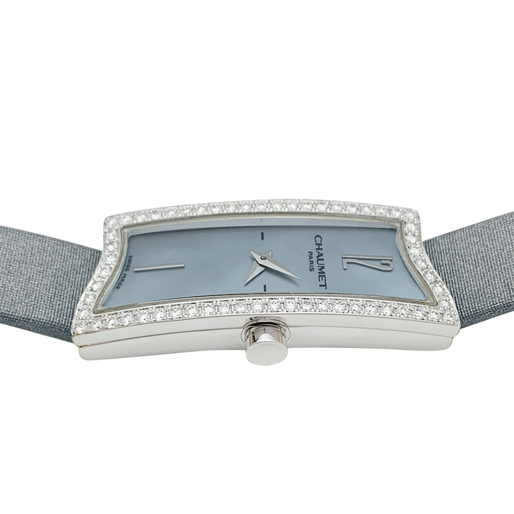 Chaumet "Frisson" watch in white gold, diamonds and mother-of-pearl.