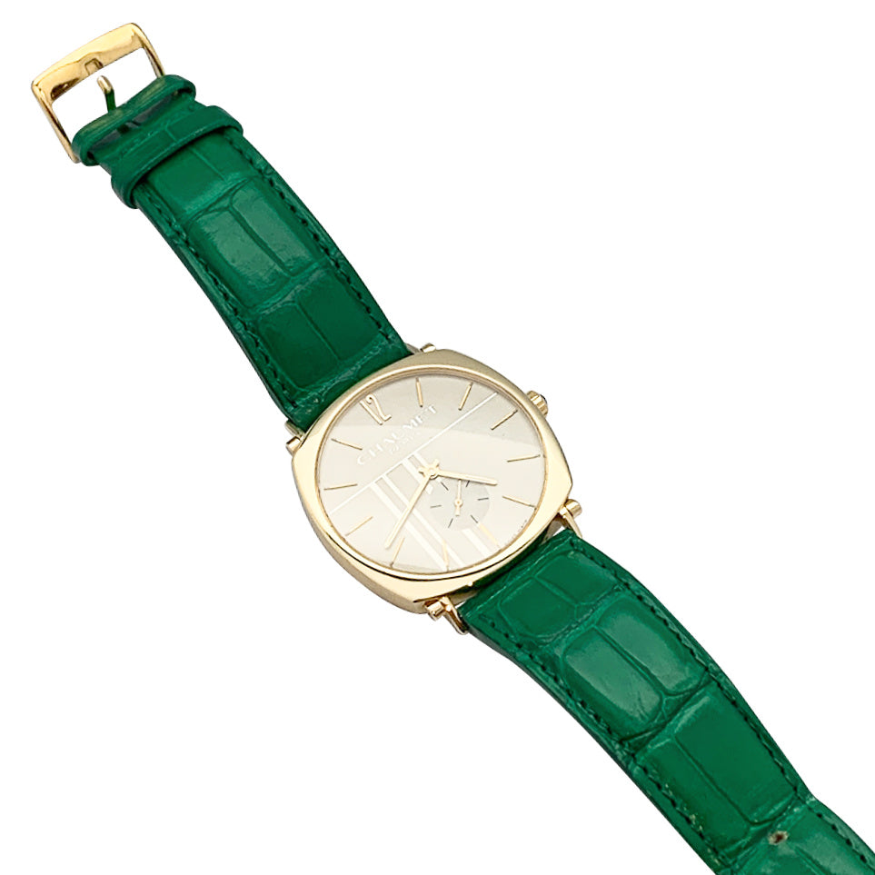 Chaumet watch, "Dandy" in yellow gold on leather.