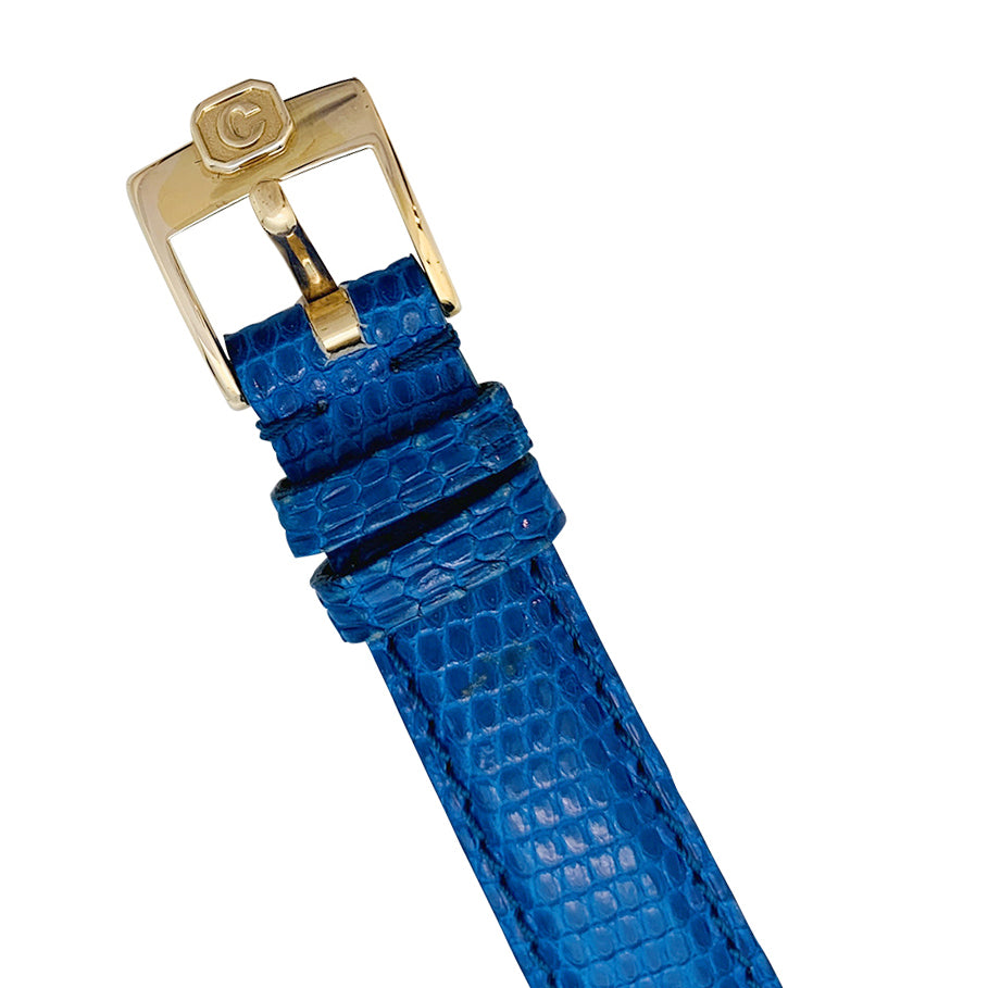Chopard "Happy Diamonds" watch in yellow gold, lapis lazuli, diamonds, leather.