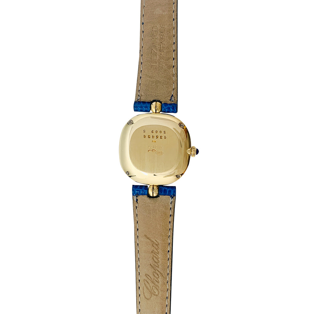 Chopard "Happy Diamonds" watch in yellow gold, lapis lazuli, diamonds, leather.