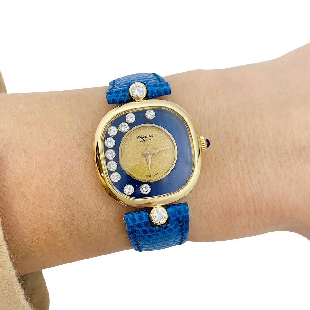 Chopard "Happy Diamonds" watch in yellow gold, lapis lazuli, diamonds, leather.