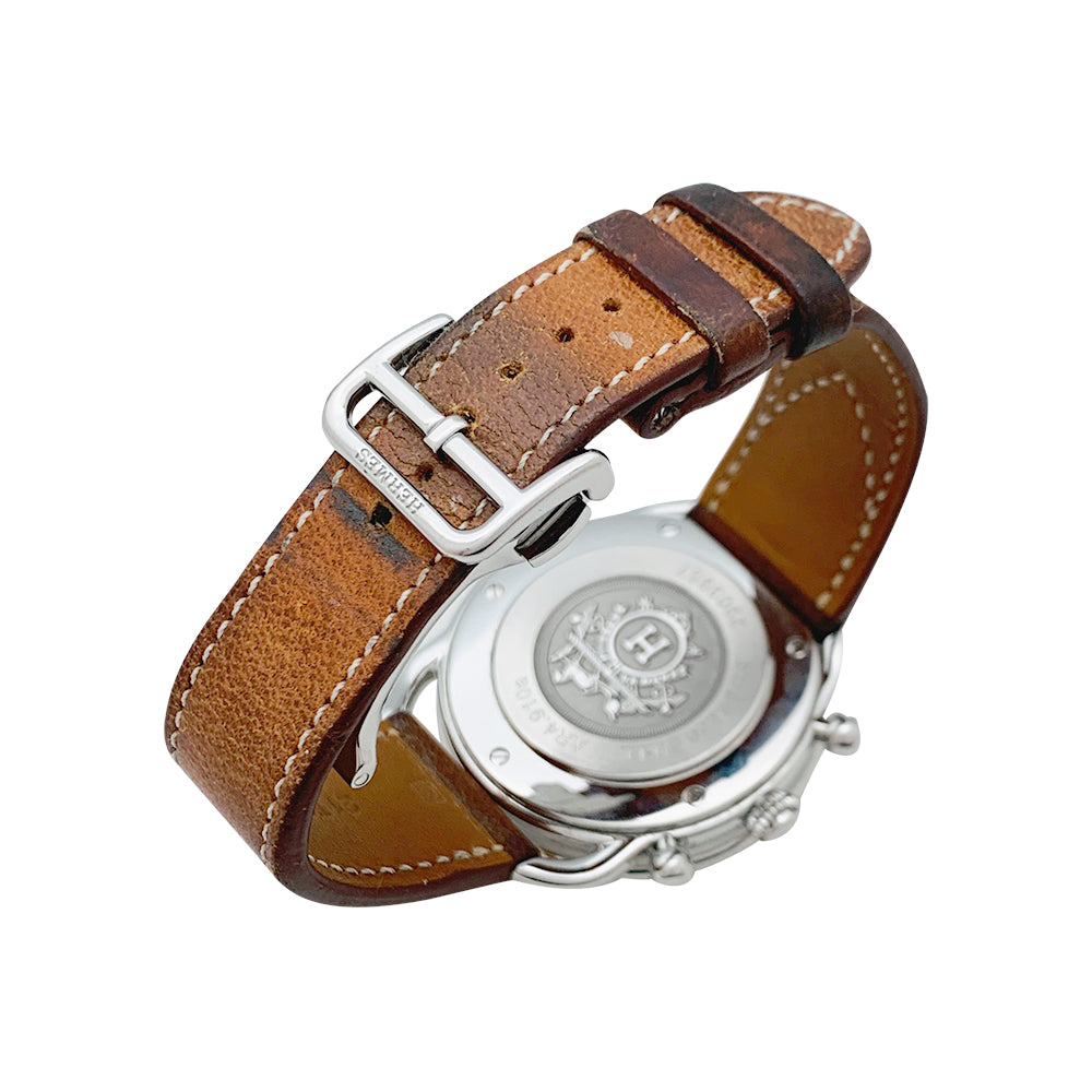 Hermès "Arceau" chronograph watch in steel and leather.
