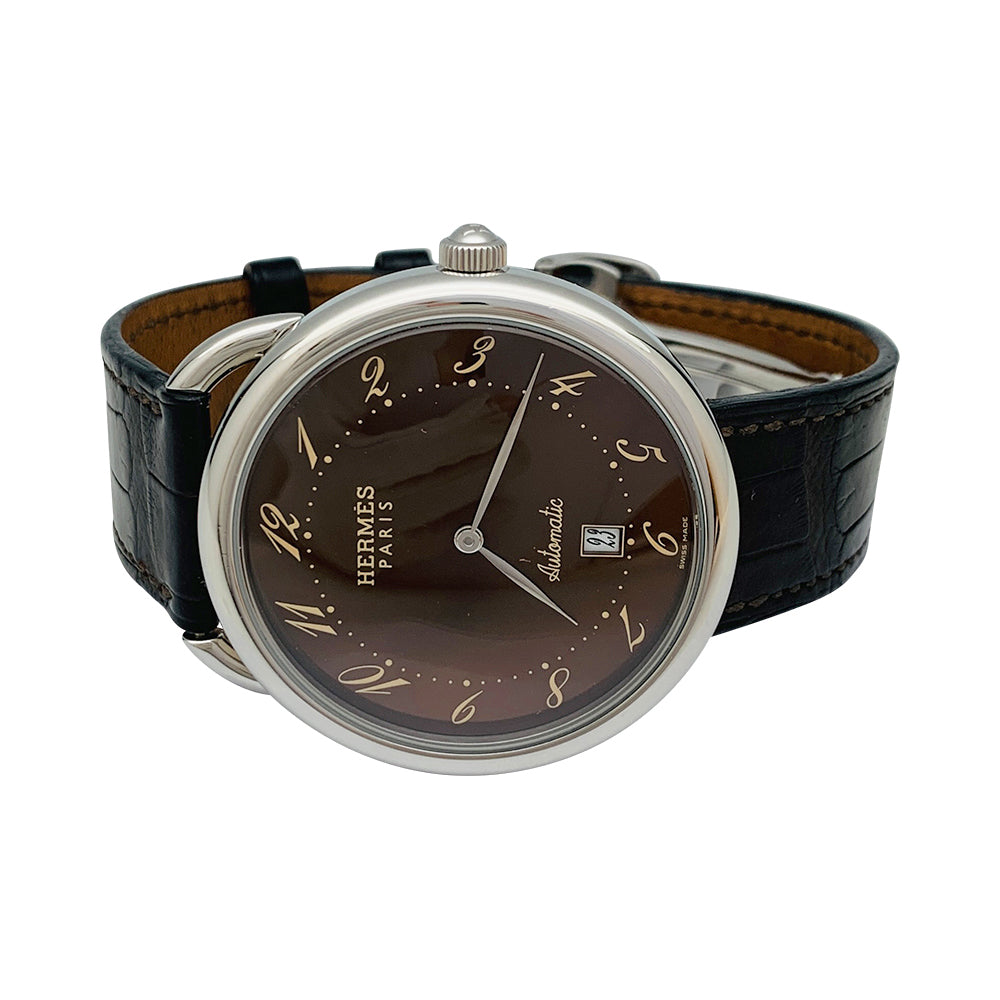 Hermès "Arceau TGM" steel watch on leather.