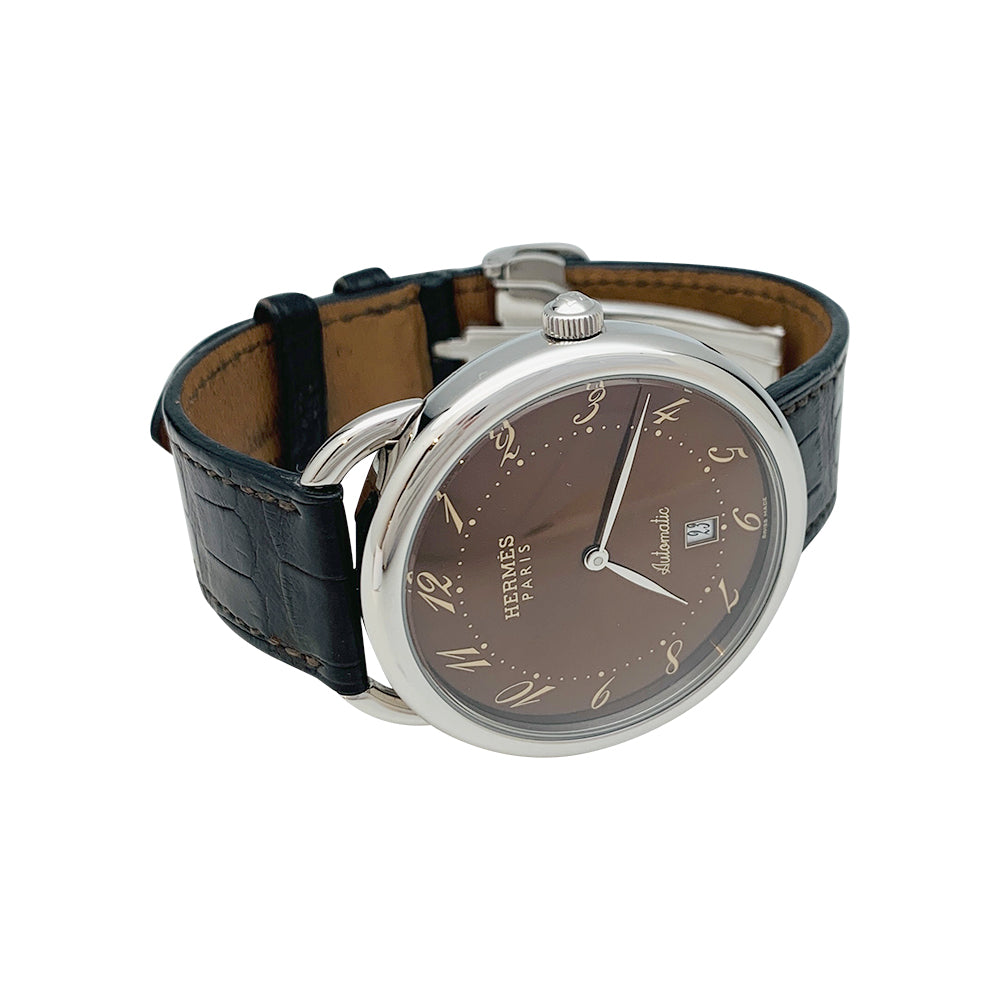 Hermès "Arceau TGM" steel watch on leather.