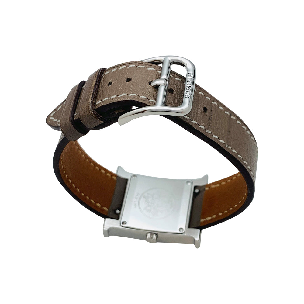Montre Hermès "Heure H" en acier, cuir.
