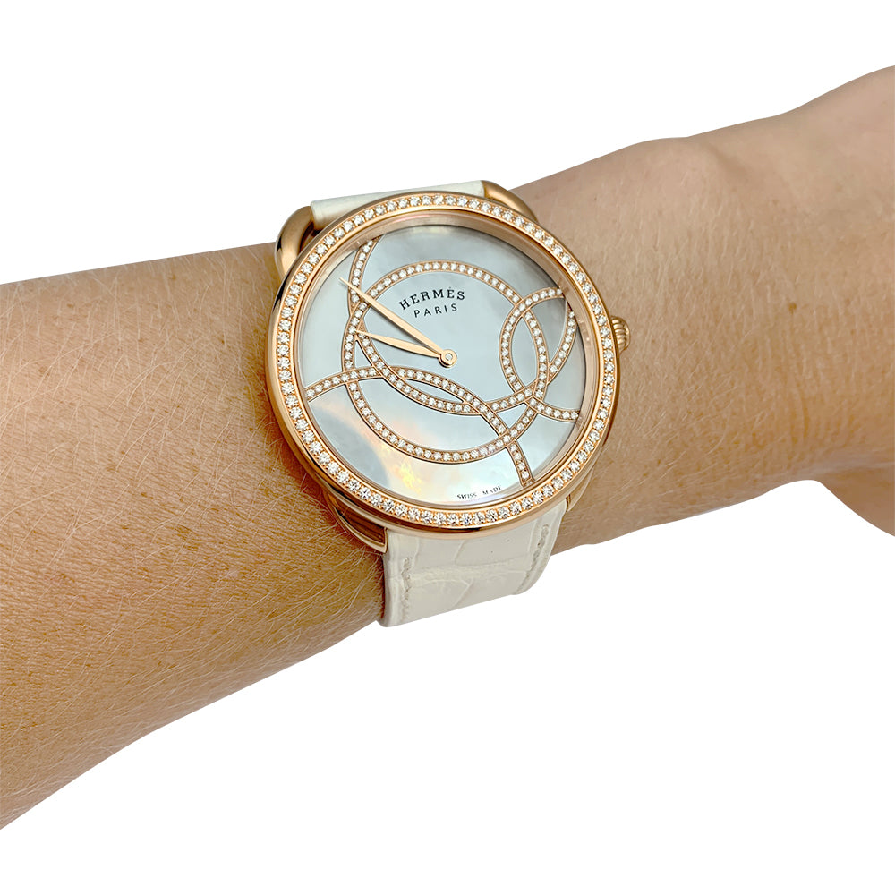 Hermès "Arceau" watch, rose gold, diamonds and leather.