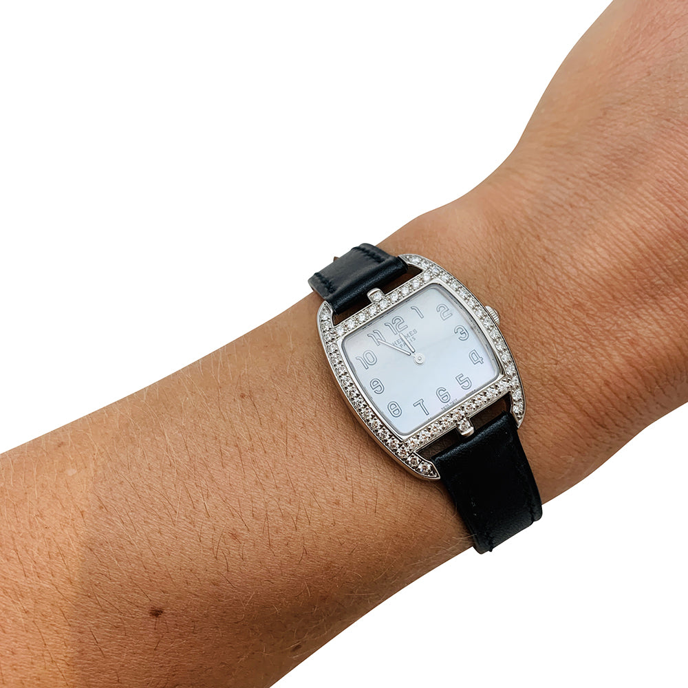 Hermès watch, "Cape Cod Tonneau" model, in steel and diamonds on leather.