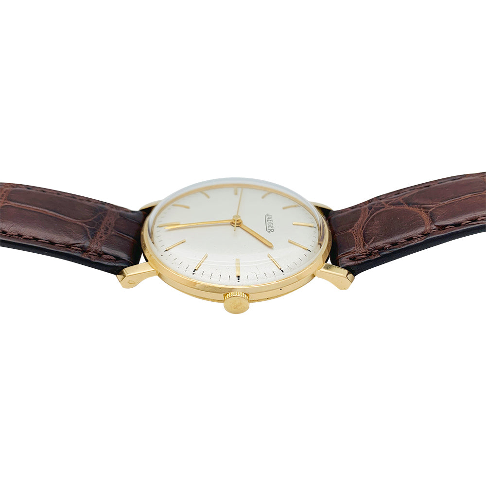Montre Jaeger en or rose, bracelet cuir.