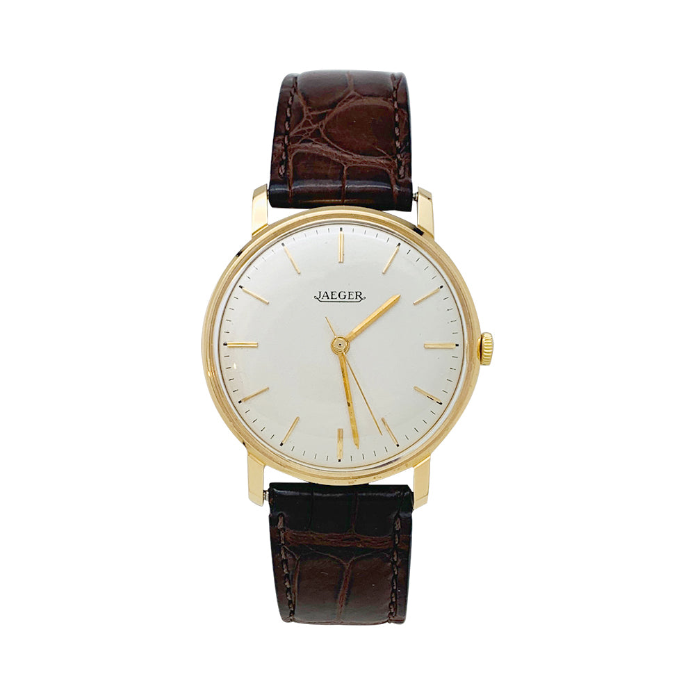 Montre Jaeger en or rose, bracelet cuir.