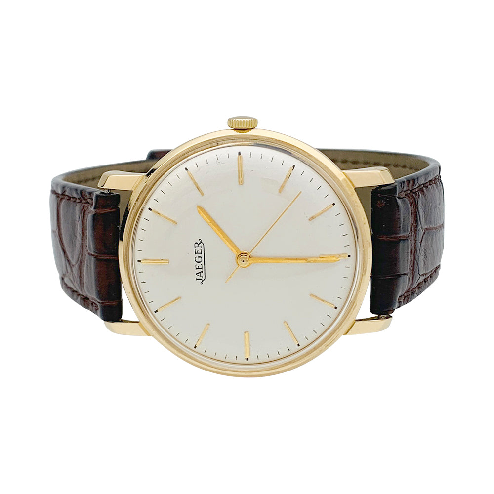 Montre Jaeger en or rose, bracelet cuir.