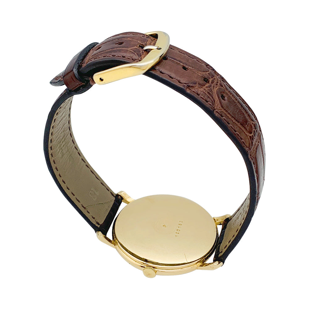 Montre Jaeger en or rose, bracelet cuir.