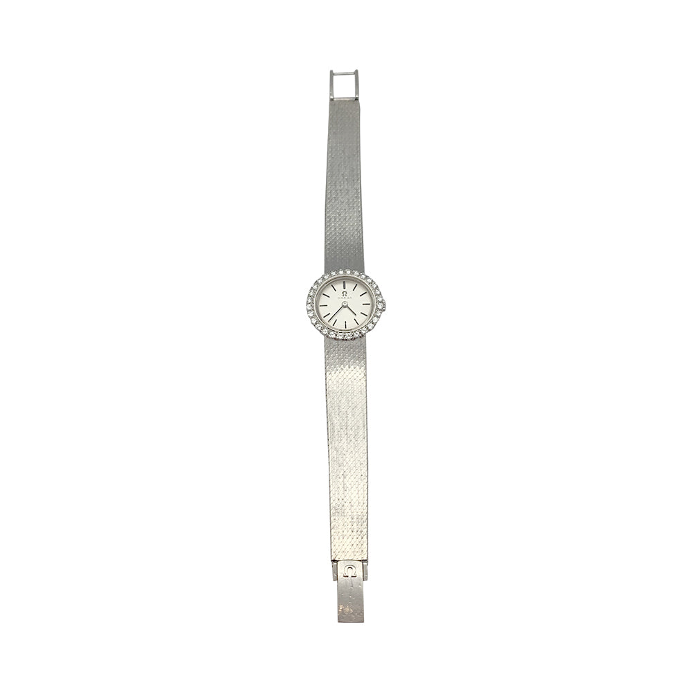 Montre Omega or blanc et diamants.