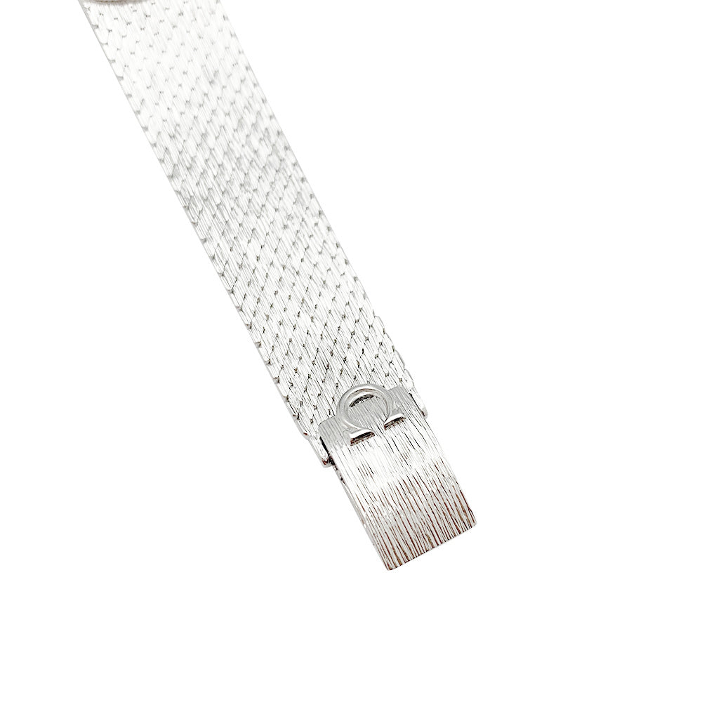 Omega watch in white gold and diamonds.