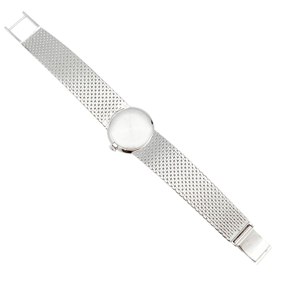 Montre Omega or blanc et diamants.