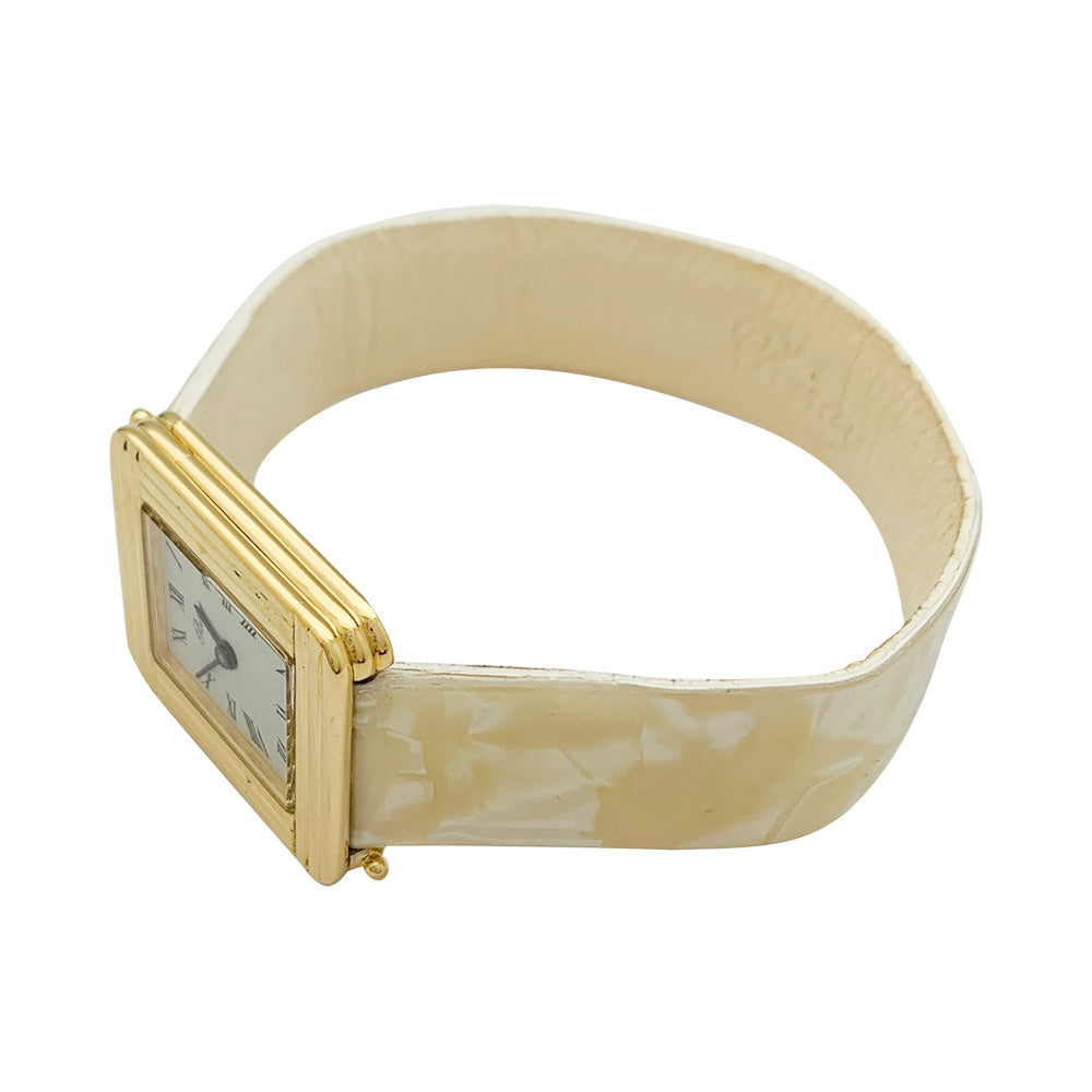 Poiray watch, "Ma Première", in yellow gold, interchangeable leather strap.