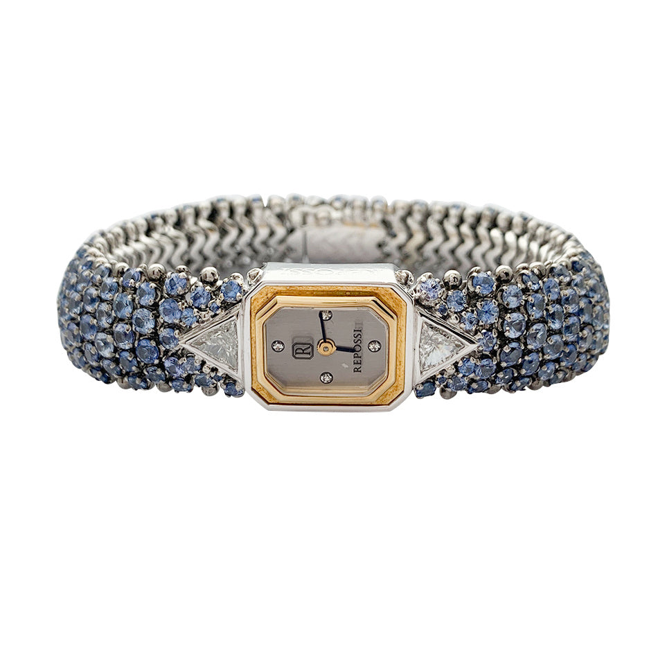 Montre Repossi, deux ors, saphirs, diamants.
