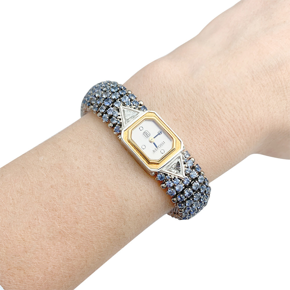 Montre Repossi, deux ors, saphirs, diamants.