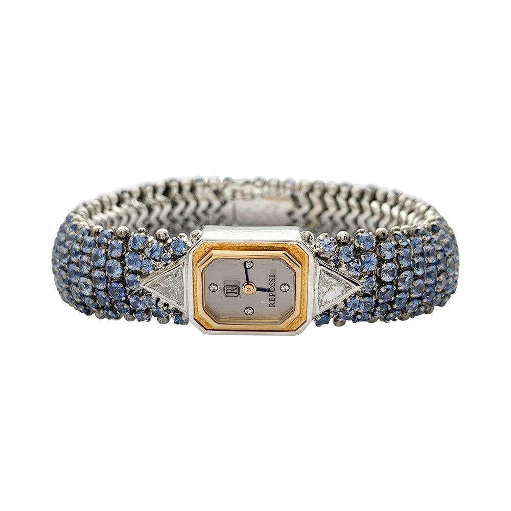 Montre Repossi, deux ors, saphirs, diamants.