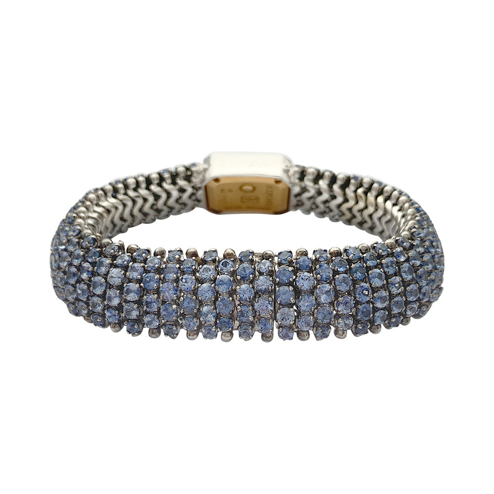 Montre Repossi, deux ors, saphirs, diamants.