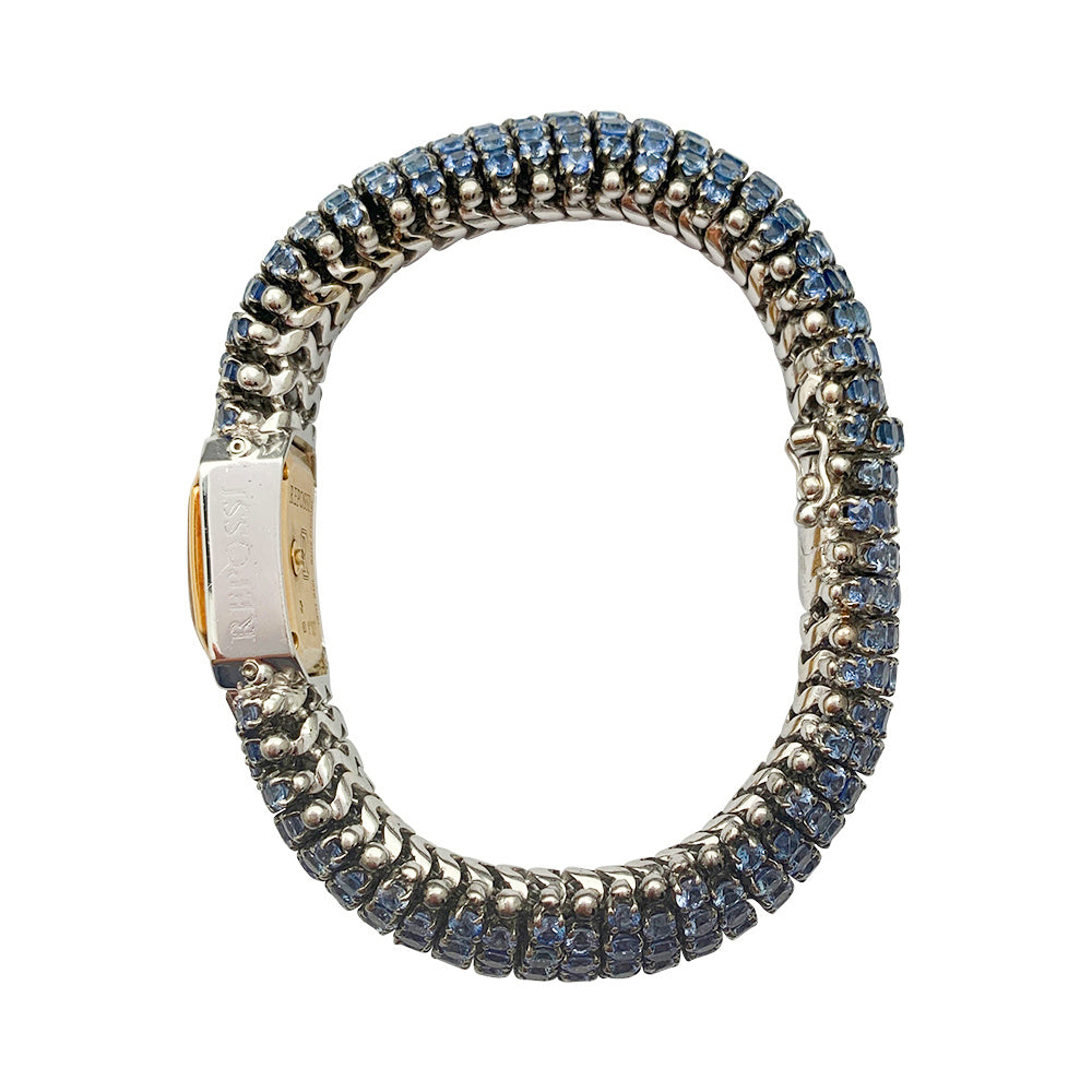 Montre Repossi, deux ors, saphirs, diamants.