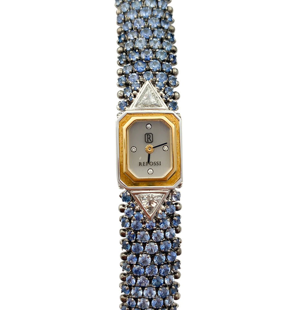 Montre Repossi, deux ors, saphirs, diamants.