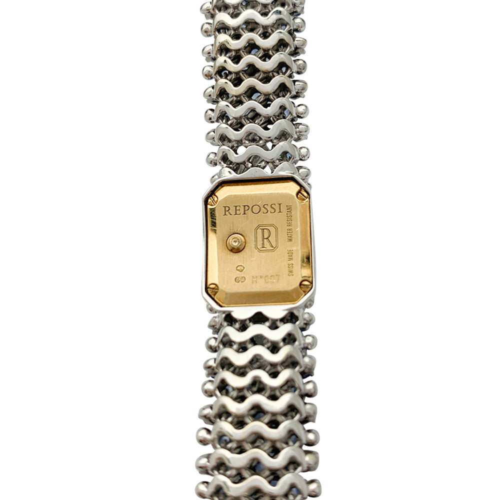 Montre Repossi, deux ors, saphirs, diamants.