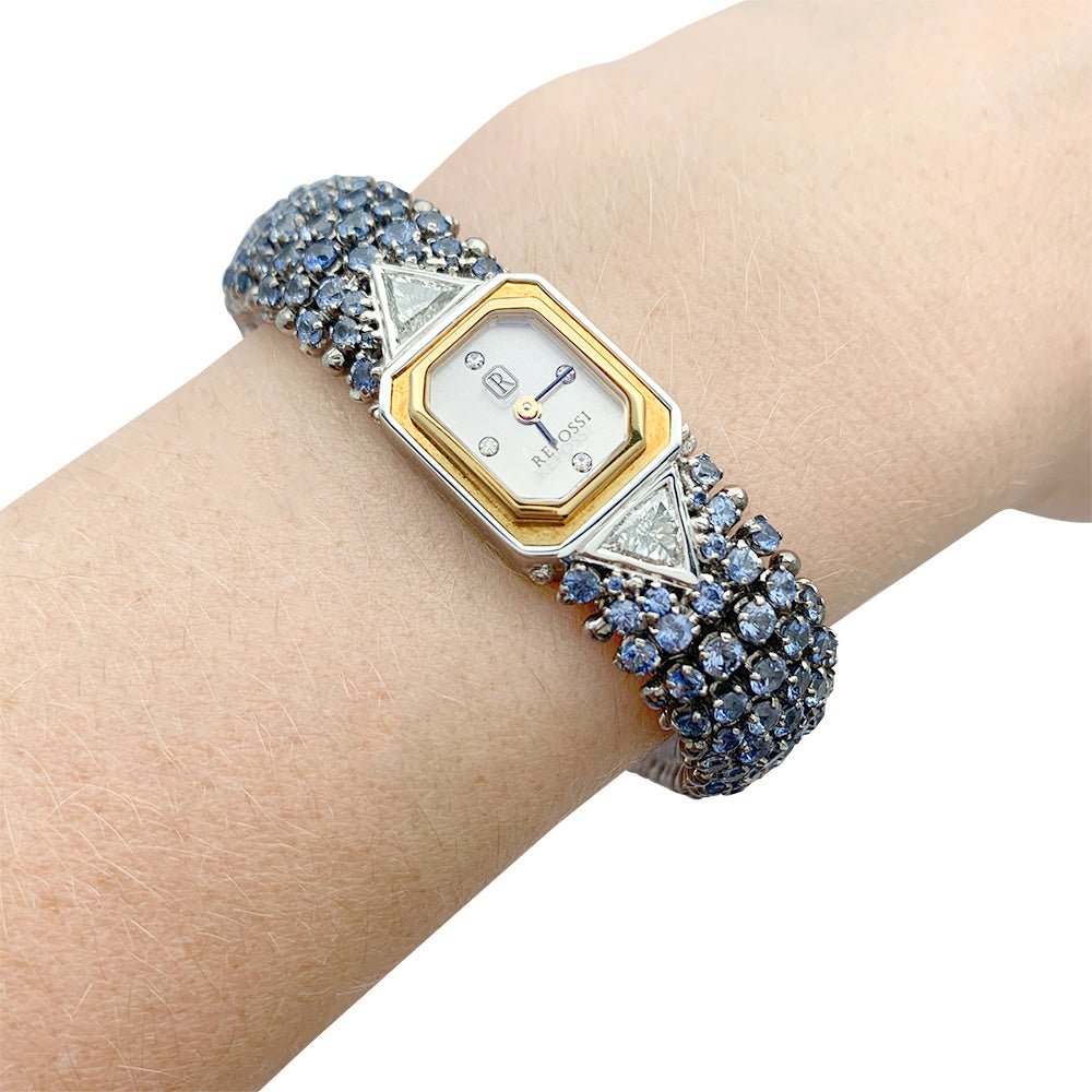 Montre Repossi, deux ors, saphirs, diamants.