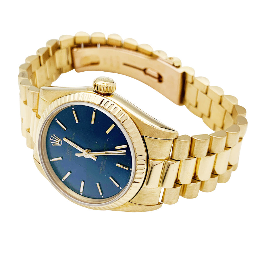 Rolex watch, “Oyster Perpetual” yellow gold.