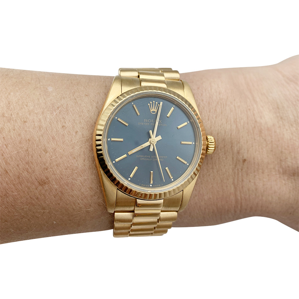 Rolex watch, “Oyster Perpetual” yellow gold.