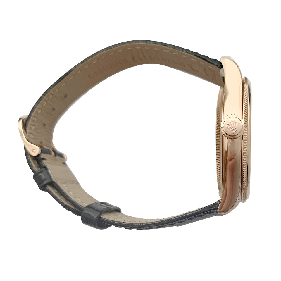 Montre Rolex, "Cellini", or rose, cuir.