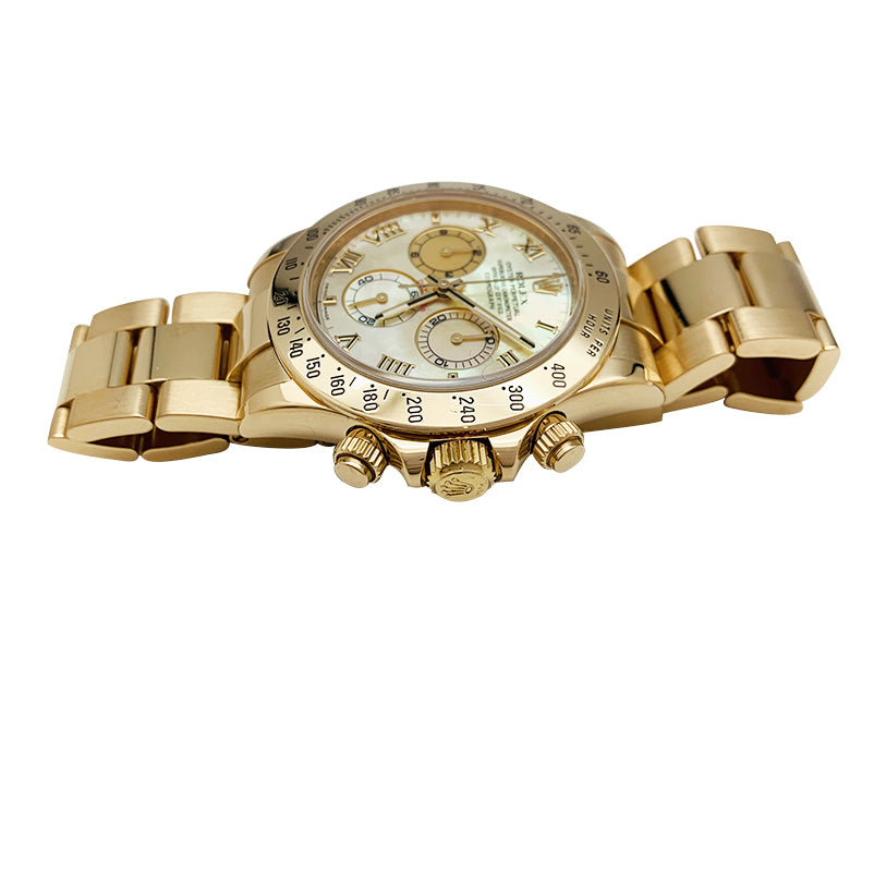 Rolex watch, "Oyster Perpetual Cosmograph Daytona" model, in yellow gold and mother-of-pearl.