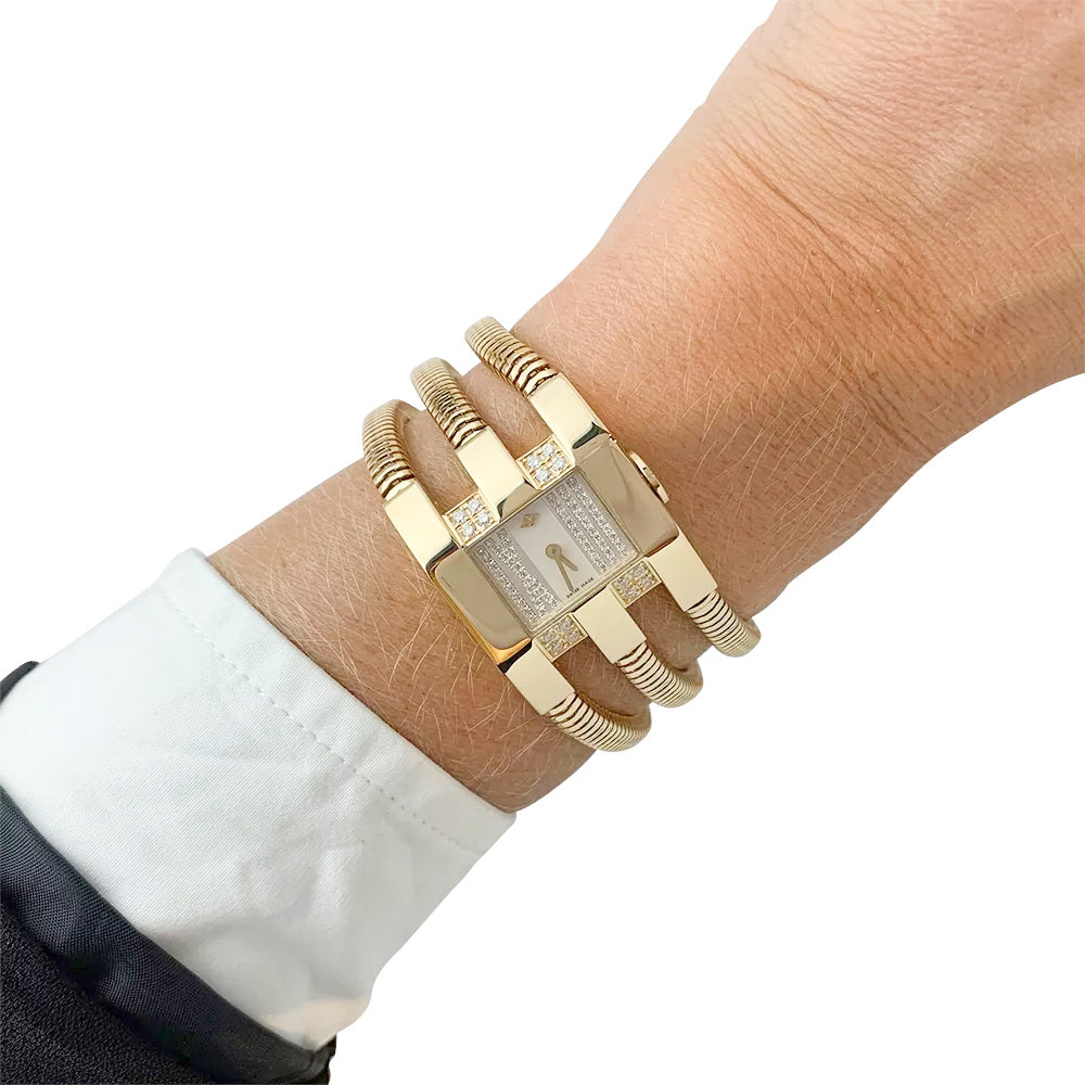 Van Cleef and Arpels watch in yellow gold and diamonds