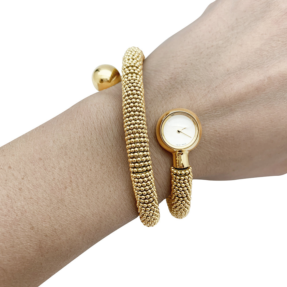 Montre Van Cleef & Arpels "Liane Serpent" trois tours en or jaune.