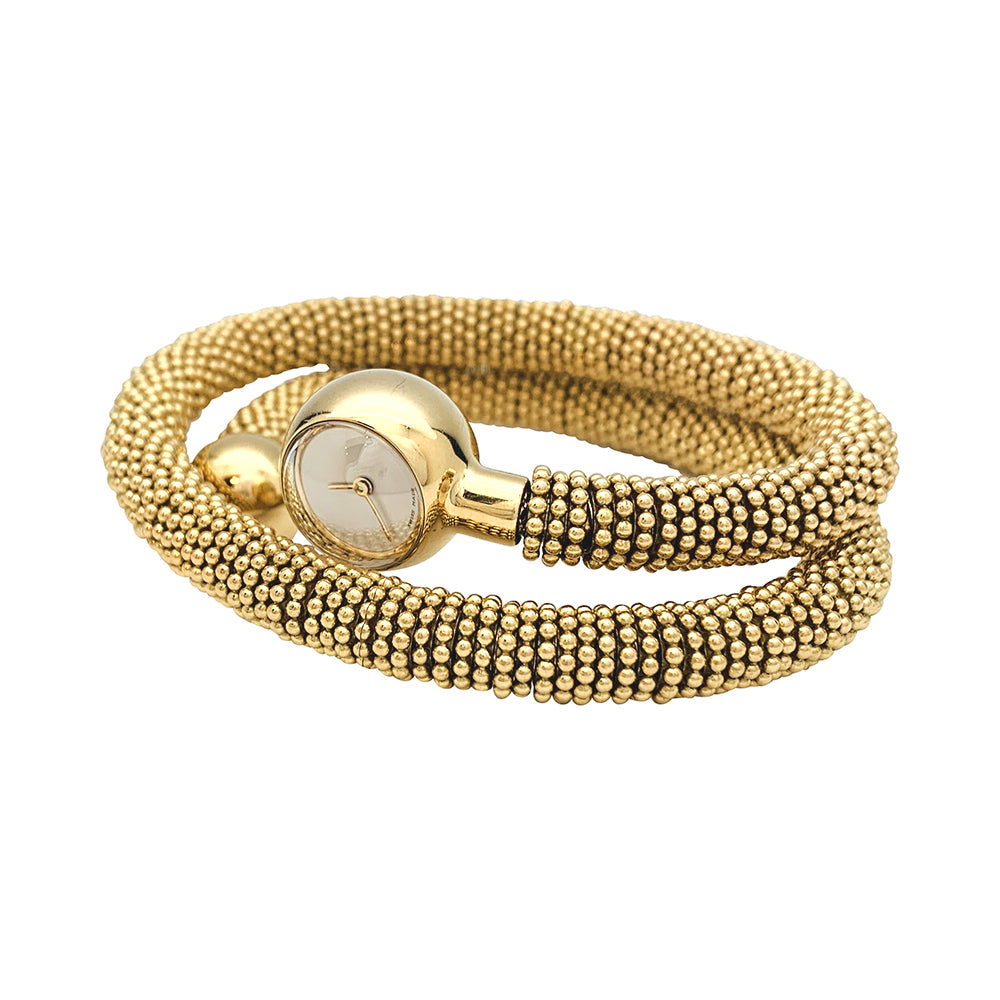 Van Cleef & Arpels "Liane Serpent" three-turn watch in yellow gold.