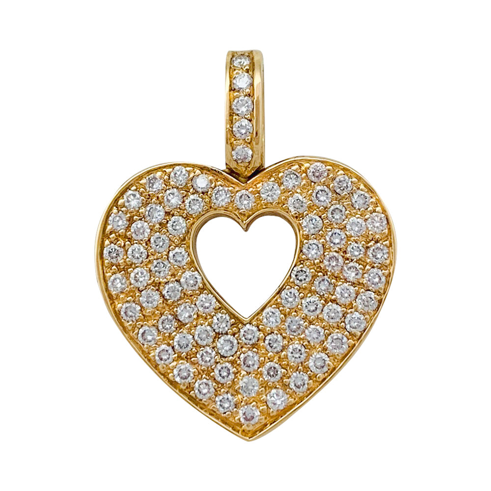Pendentif Poiray, "Coeur secret", en or jaune et diamants.