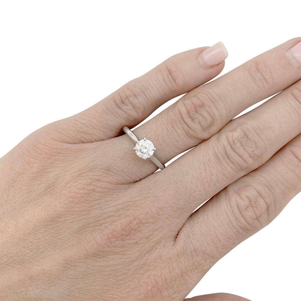 Cartier solitaire, "1895", platinum.