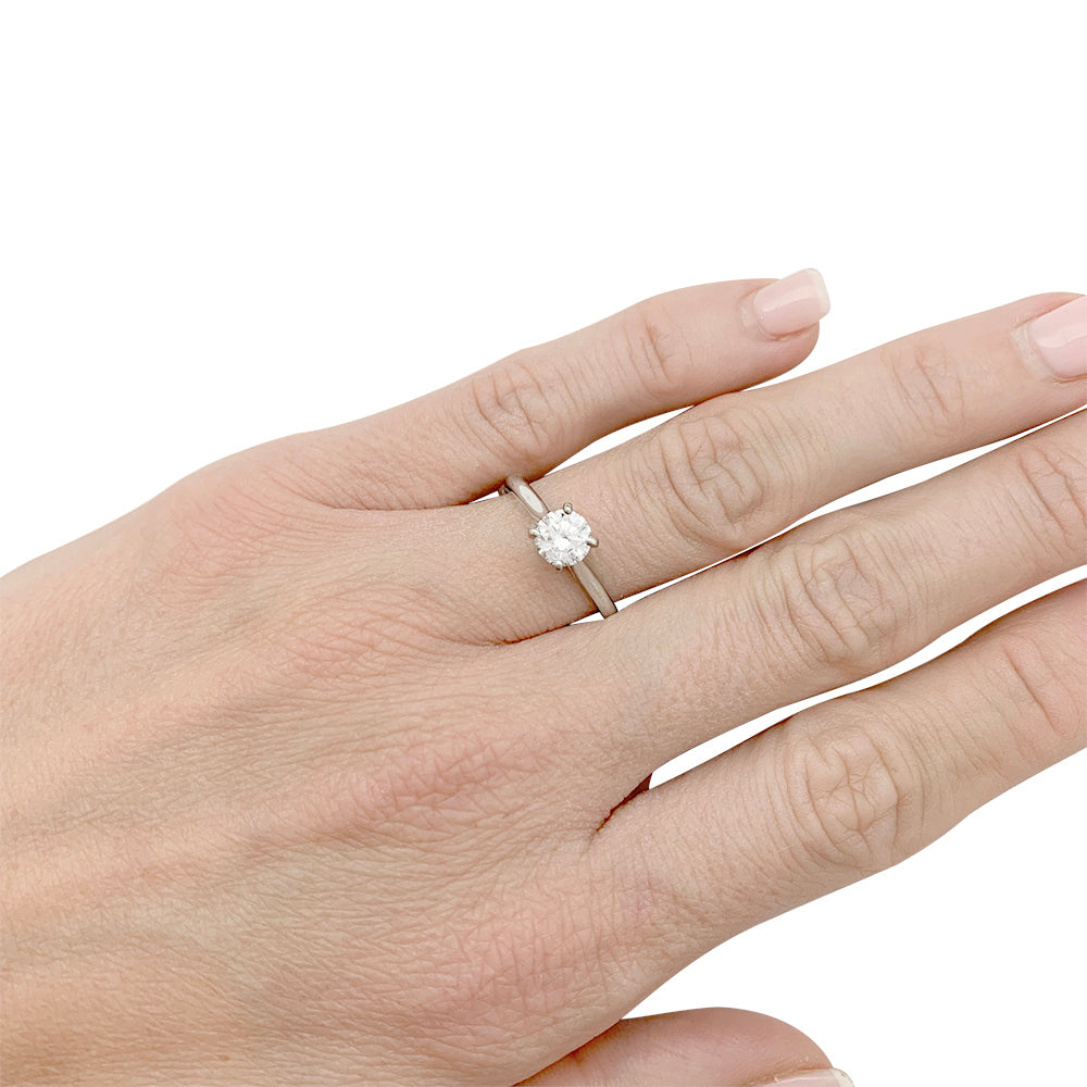 Cartier solitaire, "1895", platinum.