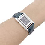 Cartier "Tank basculante" watch, steel and leather.