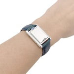 Cartier "Tank basculante" watch, steel and leather.