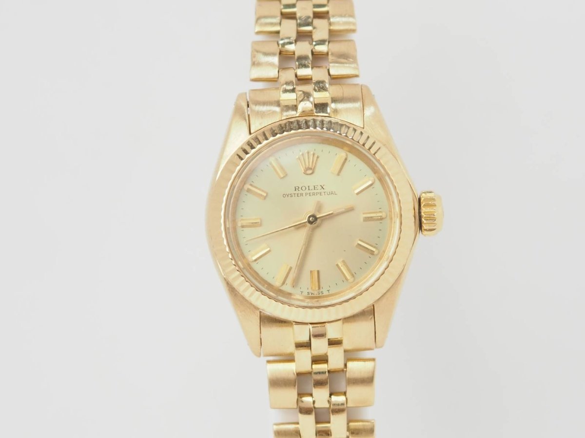 Montre Rolex Oyster Perpetual 6719 Vintage or jaune 26mm - Maison Eloe