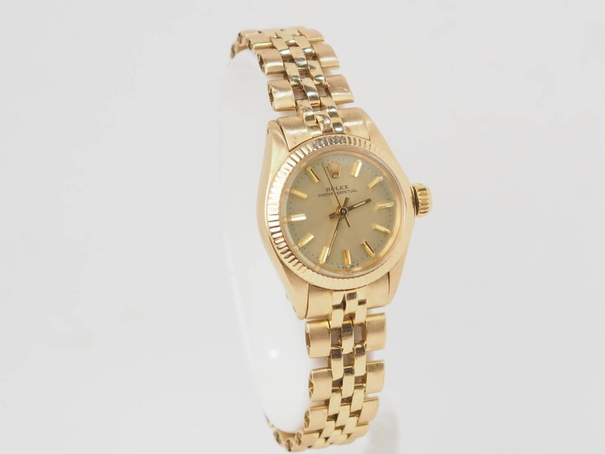 Montre Rolex Oyster Perpetual 6719 Vintage or jaune 26mm - Maison Eloe