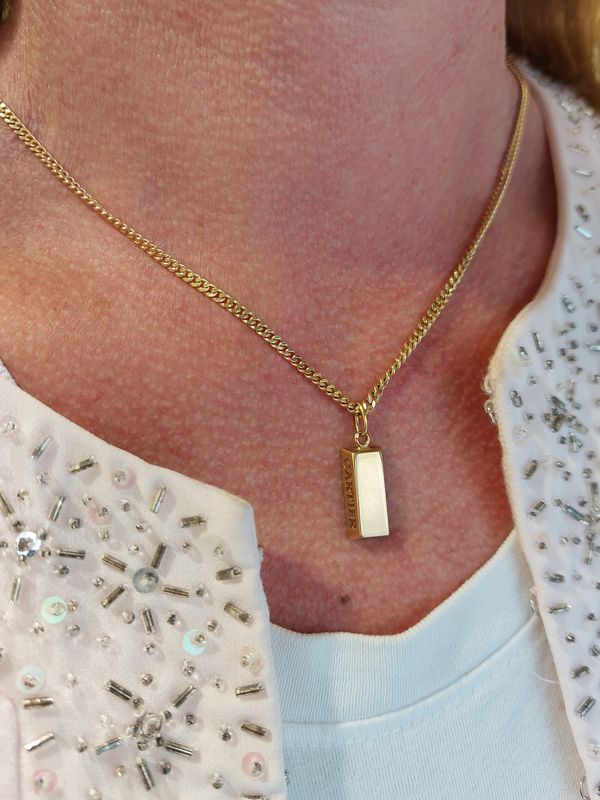 Cartier pendentif lingot en or jaune