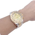 Rolex watch, "Cosmograph Daytona", yellow gold and steel.