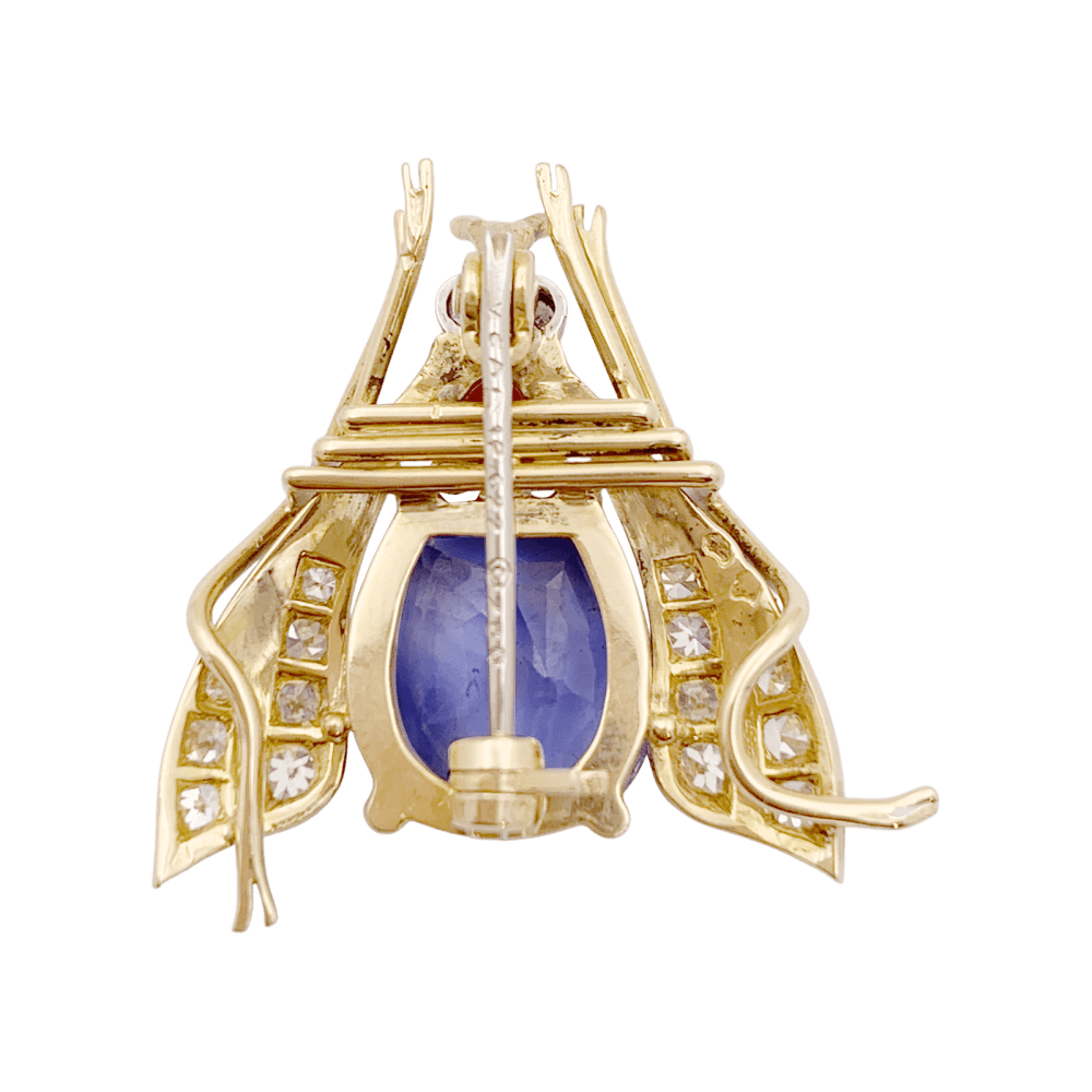 Broche Van Cleef & Arpels, « Abeille », platine, or jaune, saphir, rubis et diamants.