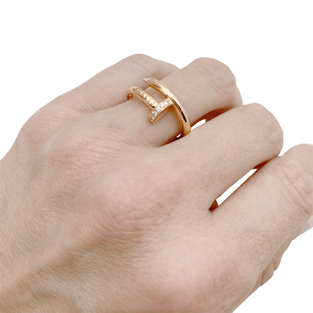 Bague Cartier, "Juste un Clou", or rose et diamants.