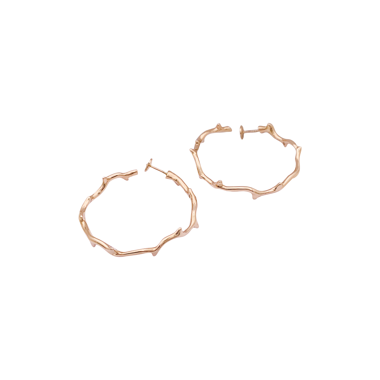 Boucles d'oreilles Dior, "Bois de Rose", or rose.