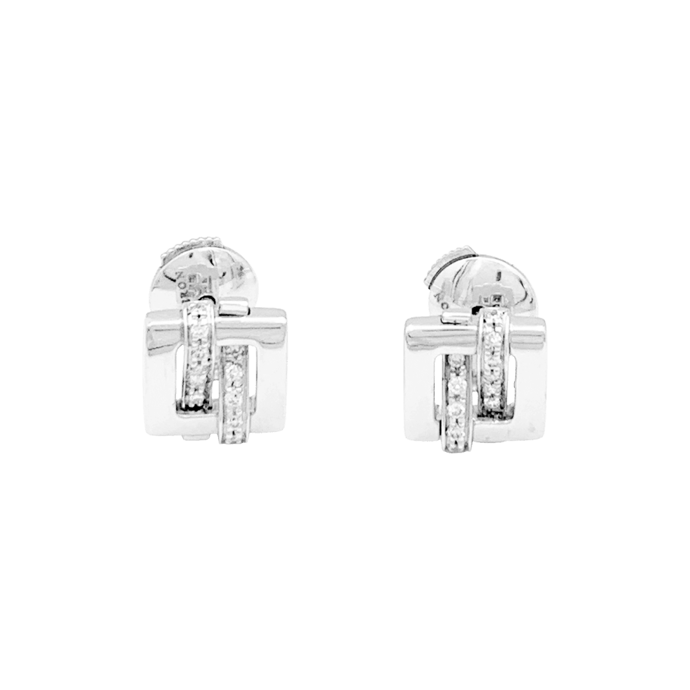 Boucles d'oreilles Boucheron, "Déchaînée", or blanc, diamants.