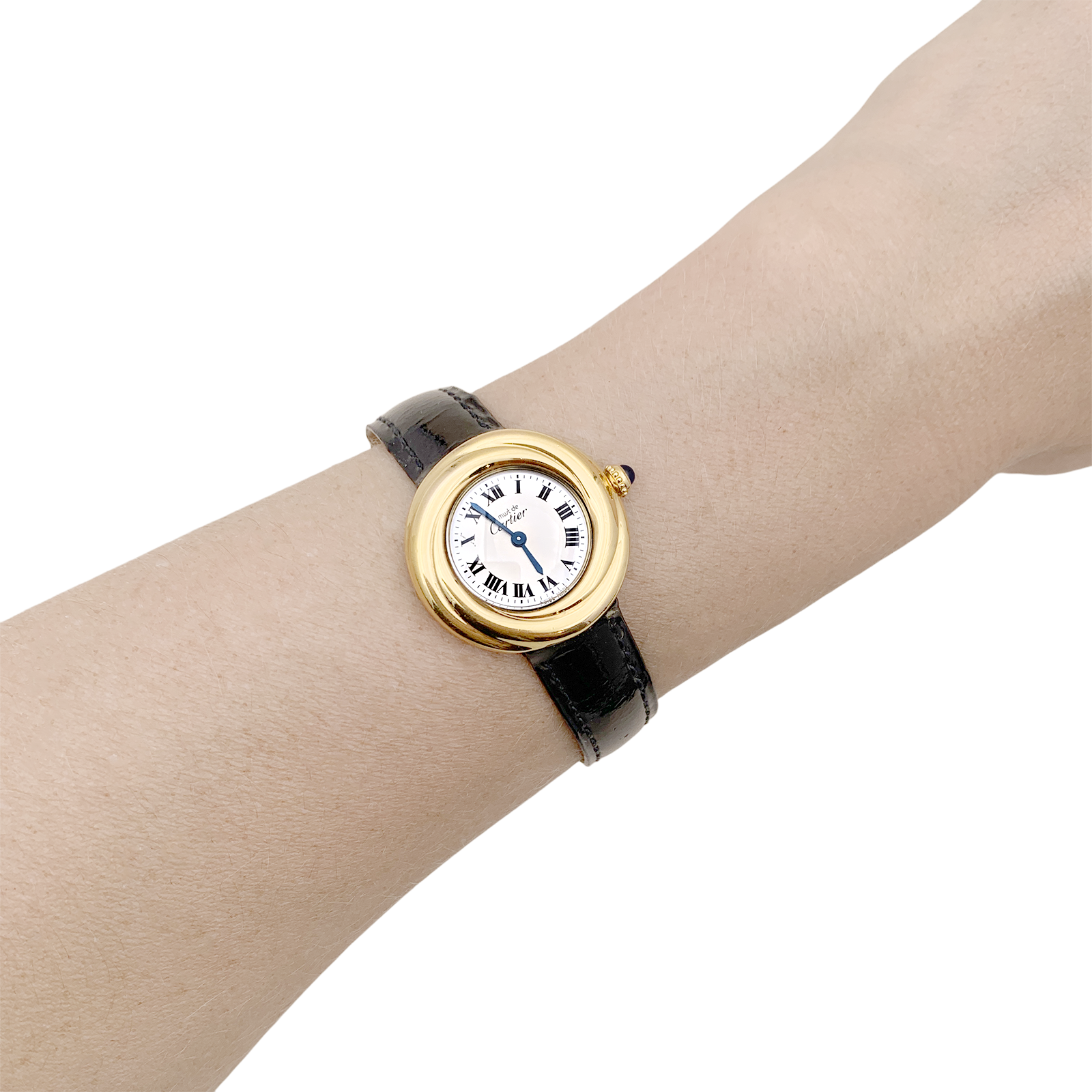 Montre Cartier, "Trinity Must", argent plaqué or, cuir.