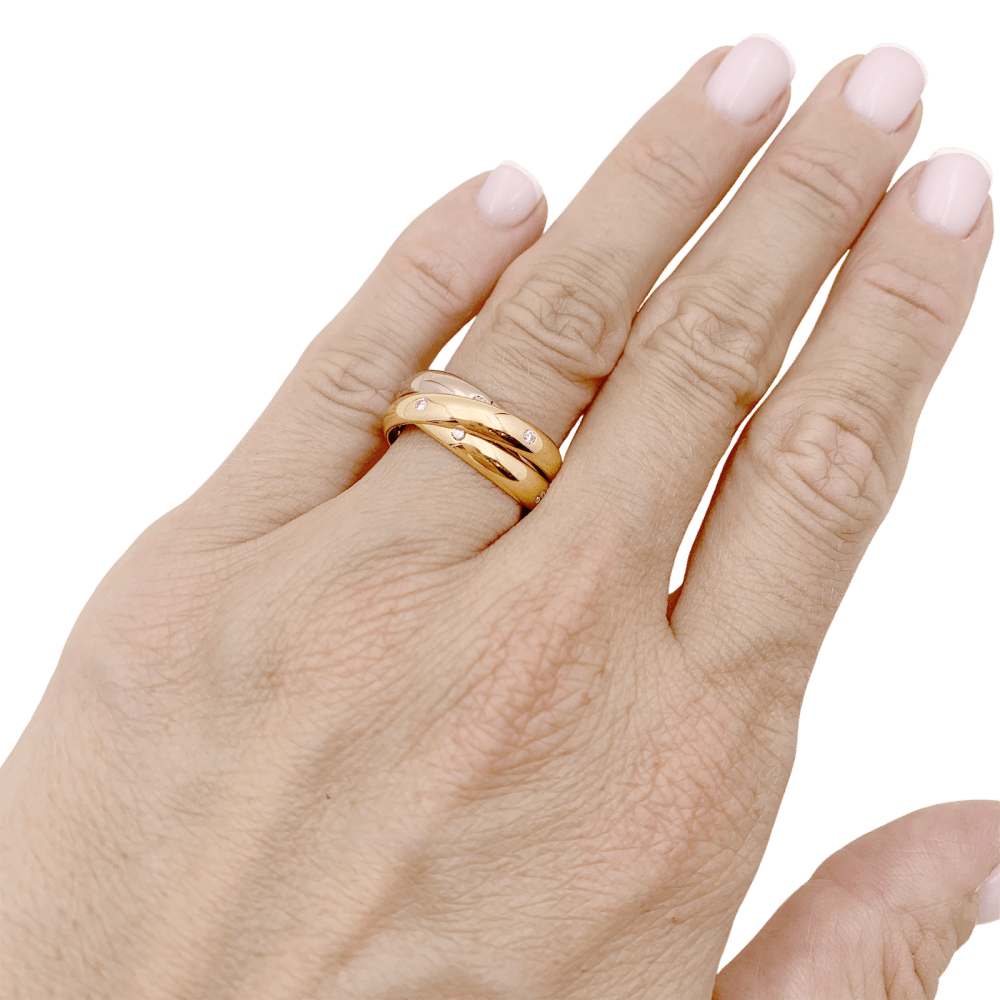 Bague Cartier, "Constellation", trois ors et diamants.